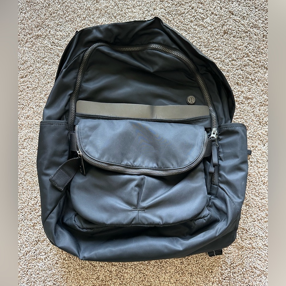Lululemon backpack with detachable crossbody purse.